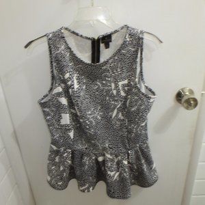 Worthington Size L  Sleevless Peplum top.